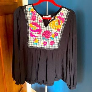 Long sleeve peplum top: Size Medium